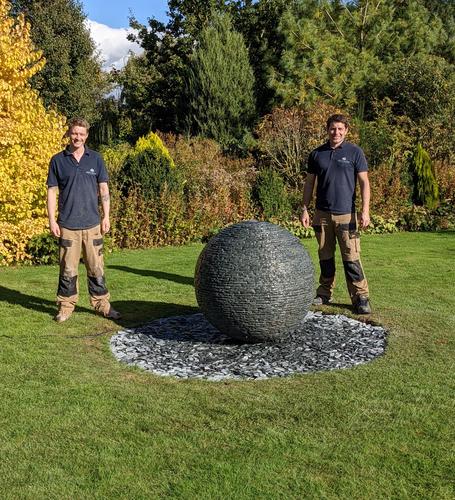 1m Grey Watersphere™ with loose slate chippings below. Set in beautiful, expansive garden ground in York. Installed here by Jeremy and Jack.