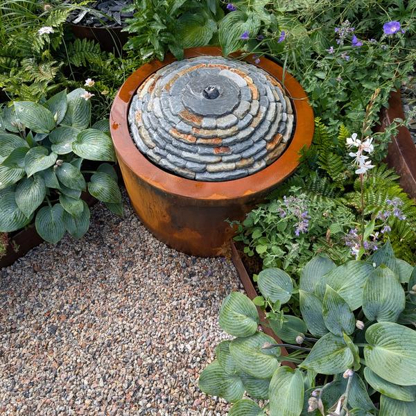 Jeremy Hastings Corten steel and slate topped water table water feature