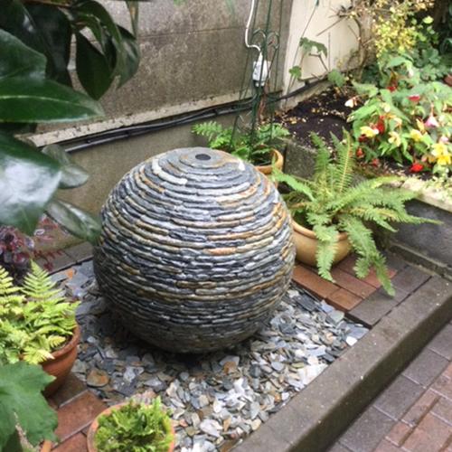 650mm Rustic Slate Watersphere™ in a small courtyard area