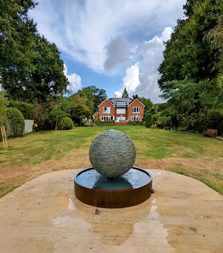 Jeremy Hastings 1.2m extra large rustic slate ball water feature, front view