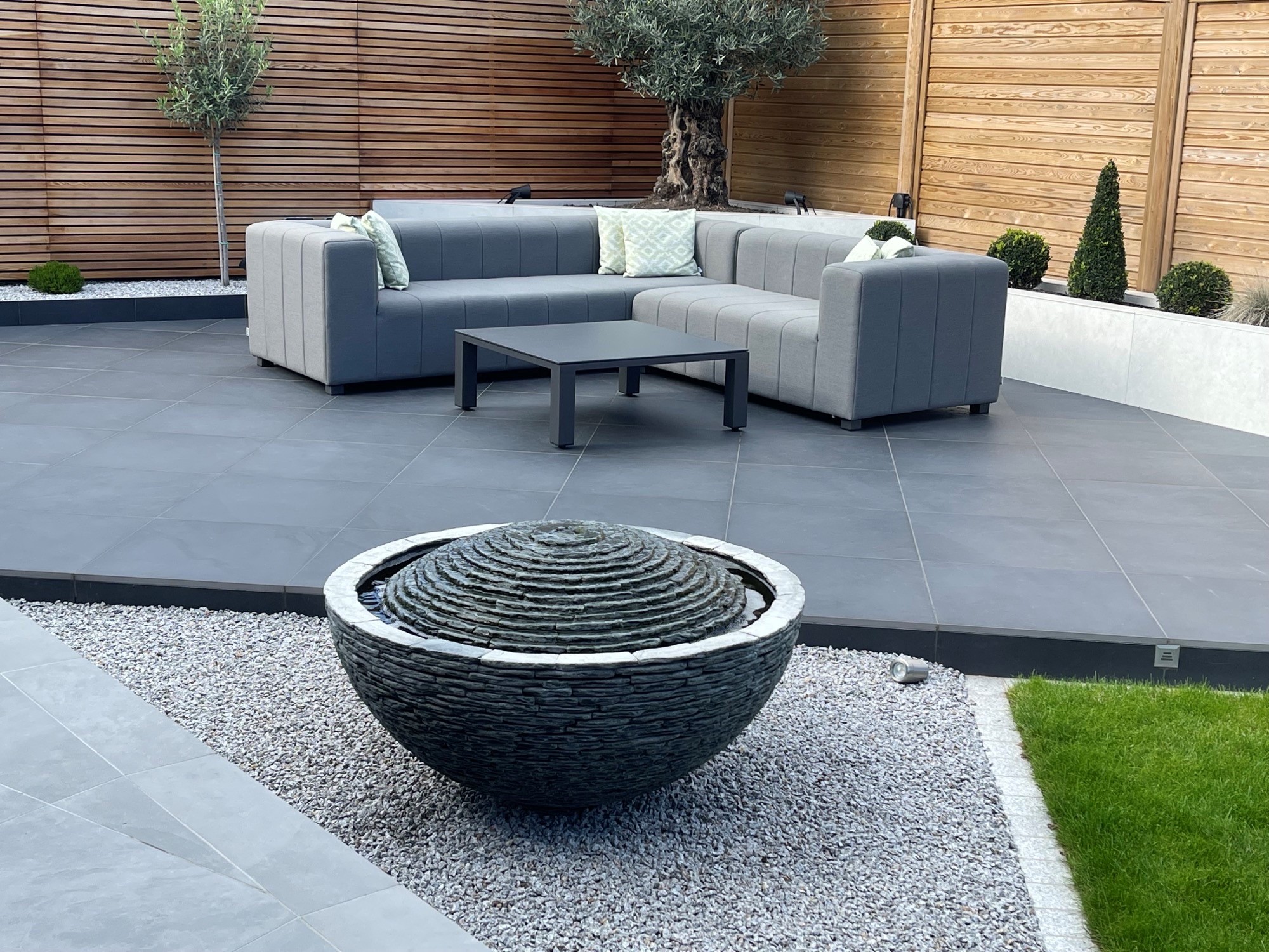 Jeremy Hastings bespoke grey slate semi-sphere water feature