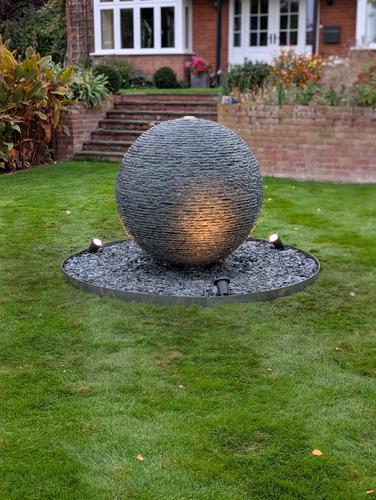 Jeremy Hastings 1m Large grey slate ball water feature with warm spike lights