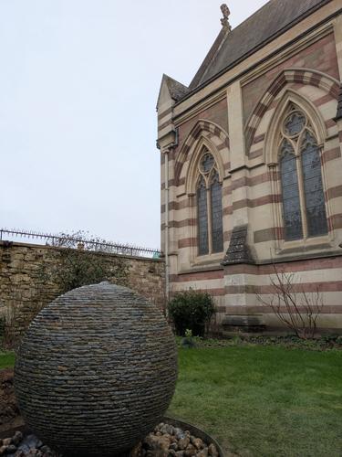 Jeremy Hastings 1m Large rustic slate ball water feature, Oxford university garden