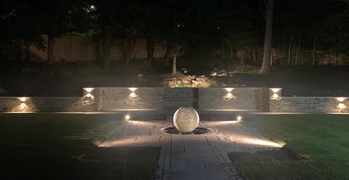 Jeremy Hastings 1m Large rustic slate ball water feature, night time photo