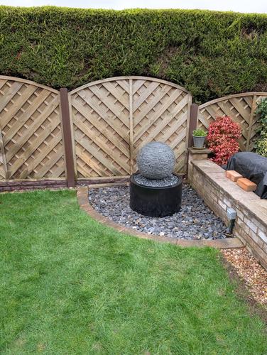 Jeremy Hastings 500mm extra small grey slate ball water feature, front view