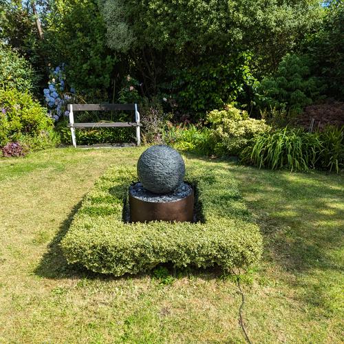 Jeremy Hastings 500mm extra small grey slate ball water feature, front view