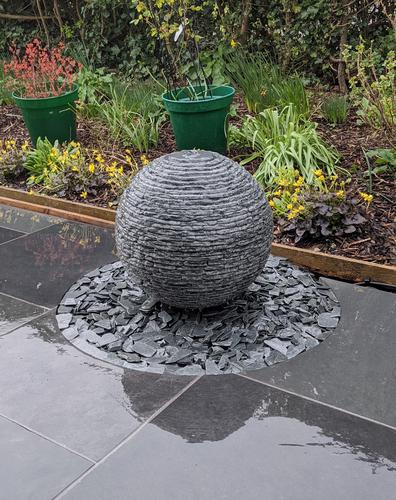 Jeremy Hastings 500mm extra small grey slate ball water feature, front view