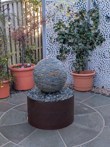 Jeremy Hastings 500mm extra small rustic slate ball water feature, front view