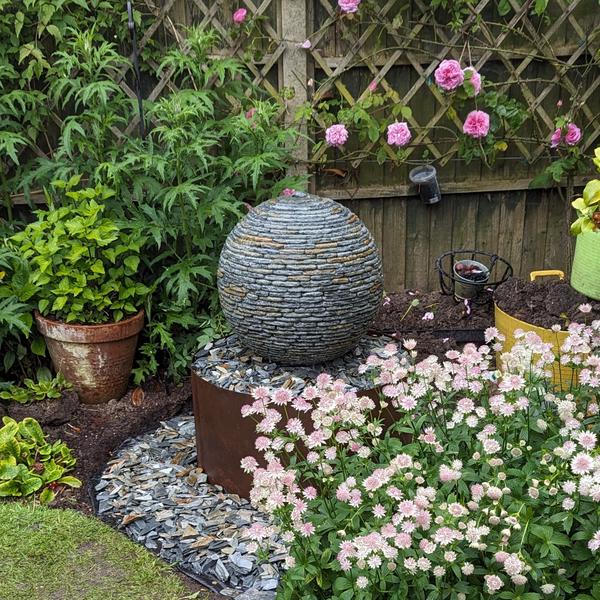 Jeremy Hastings 500mm rustic slate ball water feature with corten steel base