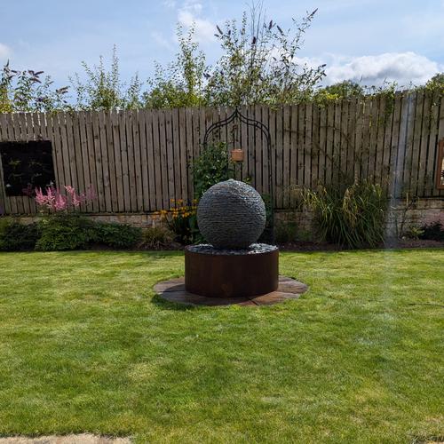Jeremy Hastings 650mm small rustic slate ball water feature, lawn