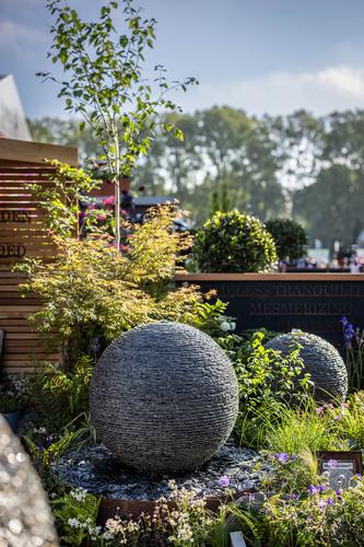 Jeremy Hastings 800mm grey slate ball waterfeature displayed at the 5 star awarded stand at RHS Chelsea 2024