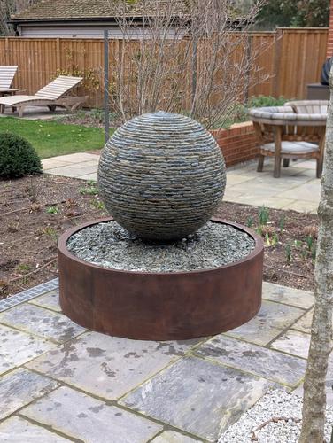 Jeremy Hastings 800mm medium rustic slate ball water feature, corten steel base