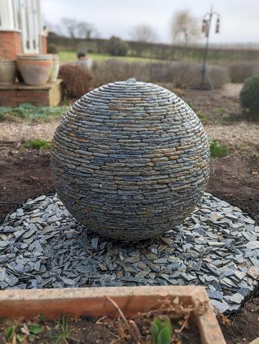 Jeremy Hastings 800mm rustic slate ball water feature, Lincolnshire.