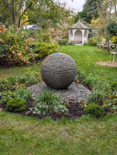 Jeremy Hastings 800mm medium rustic slate ball water feature, front view