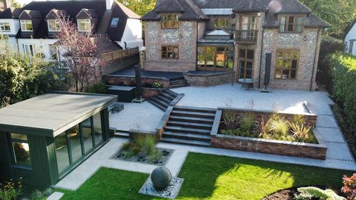 Jeremy Hastings 800mm grey slate ball water feature garden design by Monarch Lawn Landscapes