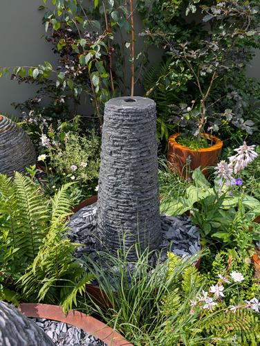 Jeremy Hastings bespoke water feature the Cornish Chimney slate water feature, Hampton Court 2025 5 star award winning stand