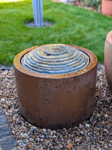 Jeremy Hastings slate and corten steel water table water feature