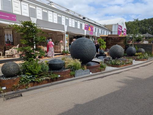 Jeremy Hastings 5 star award winning stand at RHS Chelsea 2025 showcasing the grand 1,5m diameter slate ball